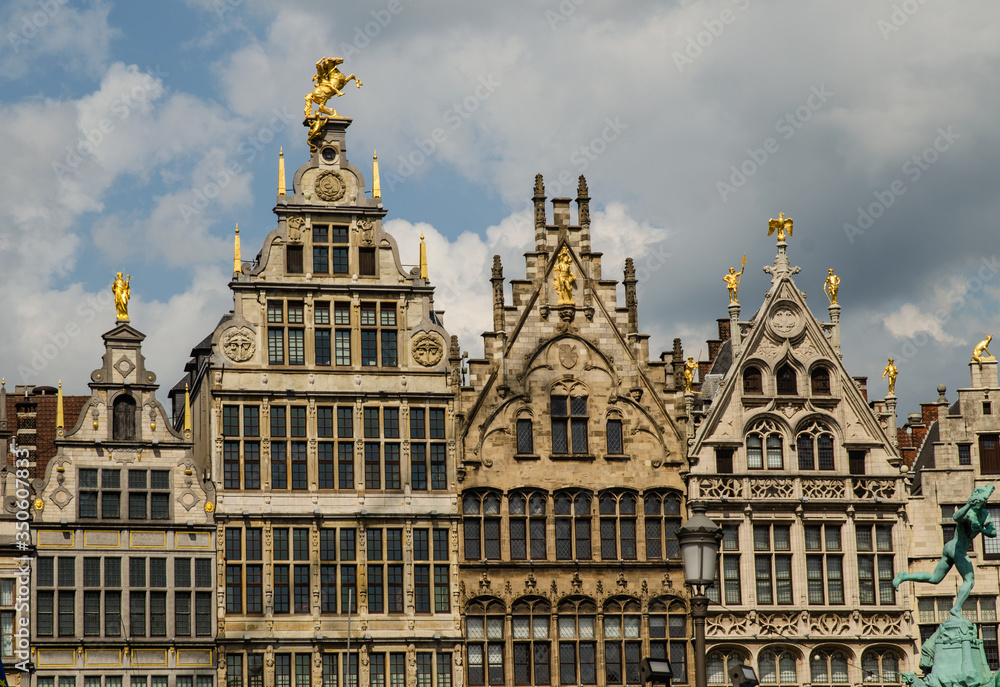 Antwerp, Flanders, Belgium. August 2019. On a beautiful sunny day detail of the facades of the guild houses in the town hall square. Elegant gilding embellishes the Renaissance architecture.
