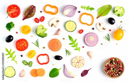 Food pattern with raw fresh ingredients of salad - tomato, cucumber, onion, herbs and spices. Vegetables isolated on white background. Healthy eating concept. Flat lay, top view.
