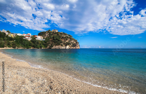 A long beach with view on fortress in Parga, Greece