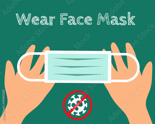Hands with face mask for use to protect corona virus (COVID-19)