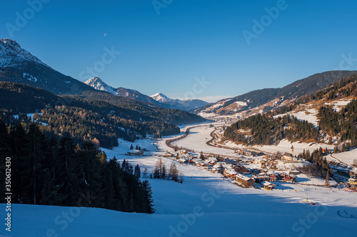 Winter landscape in Tre Cime Dolomiti, or Drei Zinnen Dolomites. Monte Elmo Sesto , Italy. January 2020. Top view on San Candido.