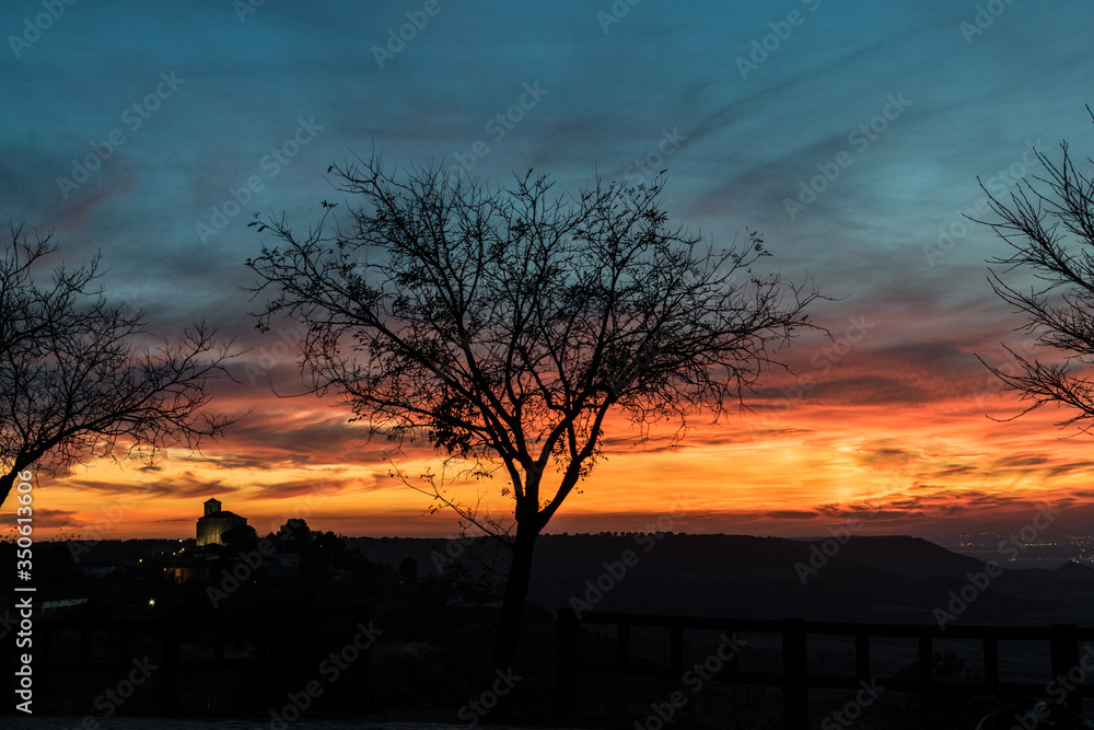 Fototapeta premium sunset at golden hour in rural area