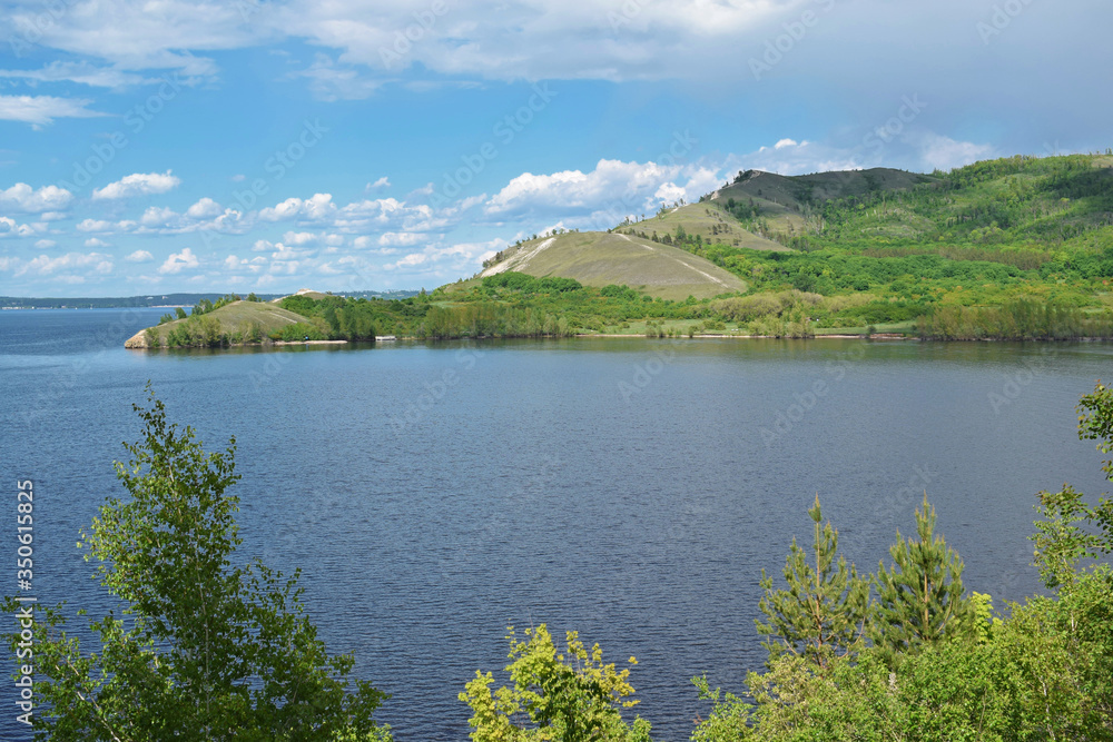 Beautiful summer landscape.Wide river and mountains. Beautiful summer landscape.Wide river and mountains.
