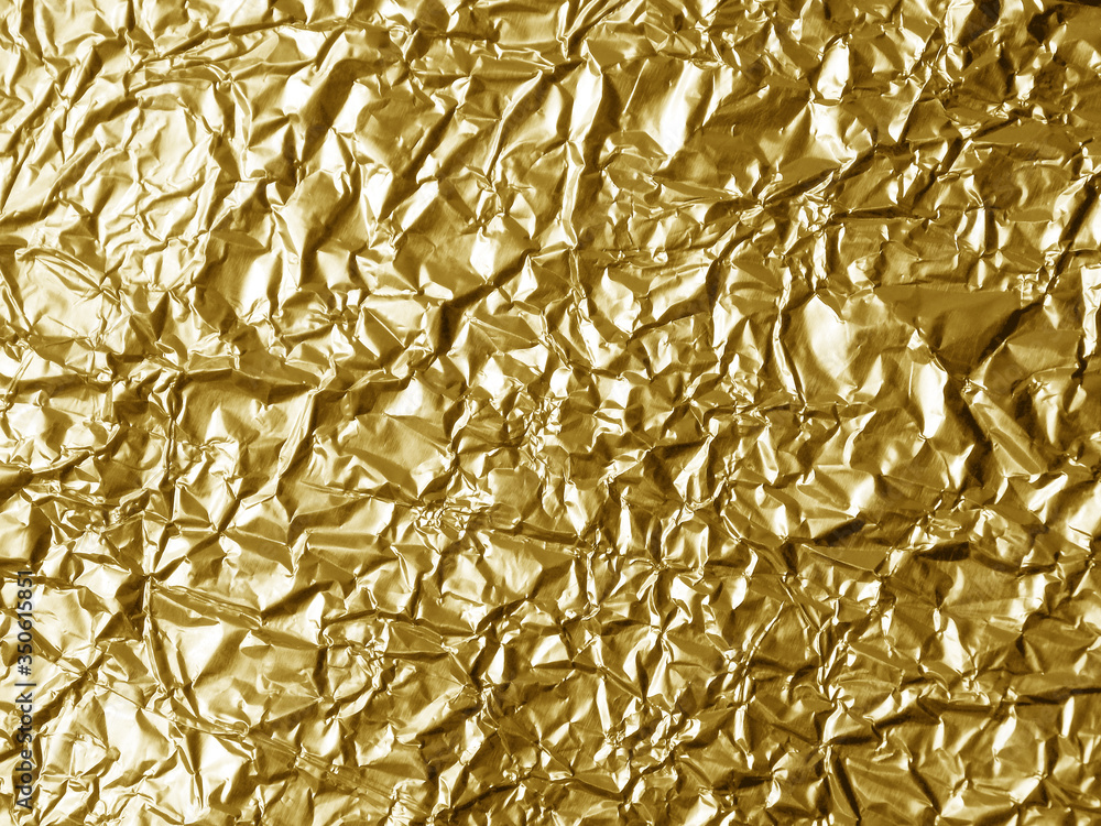 Wrinkled golden foil texture background Wrinkled golden foil texture background