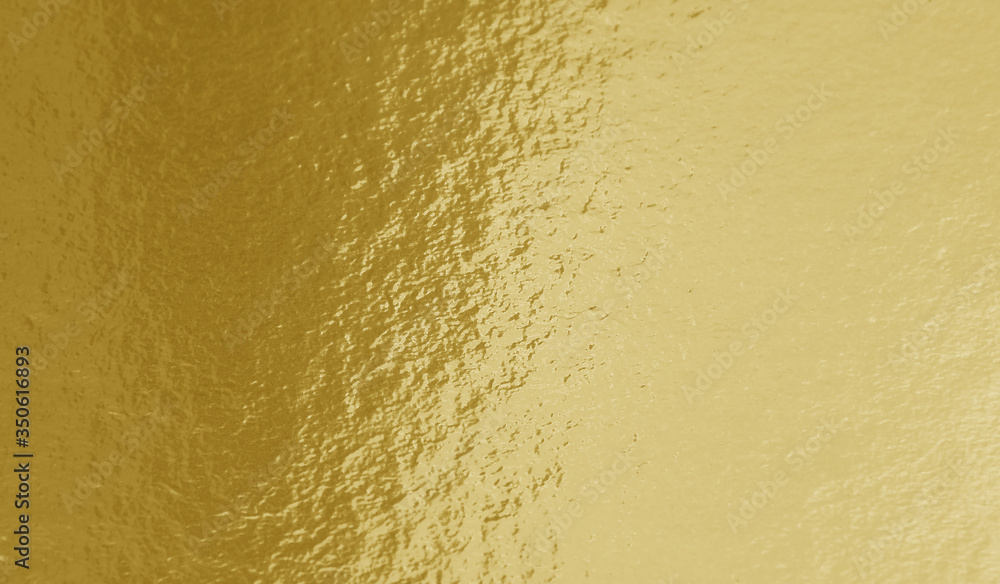 Gold foil texture background with uneven surface