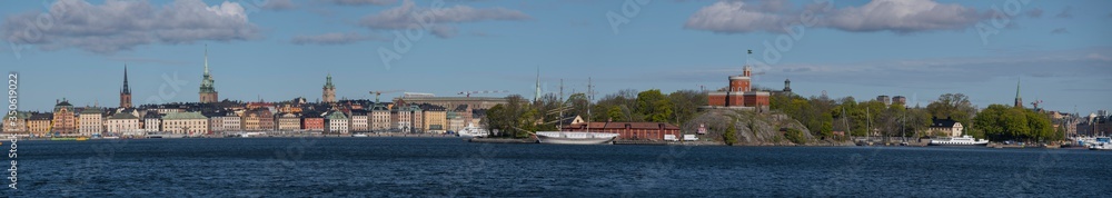 View over the old town district Gamla Stan and the islands Djurgården and Kastellholmen in Stockholm a sunny spring day View over the old town district Gamla Stan and the islands Djurgården and Kastellholmen in Stockholm a sunny spring day