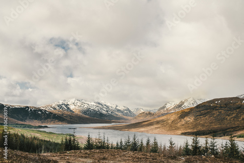 Scenic view of river passing through mountain range