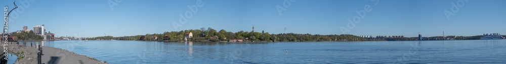Panorama view over the inlett to Stockholm water front from the district Nacka Strand to the island Lidingö and Djurgården