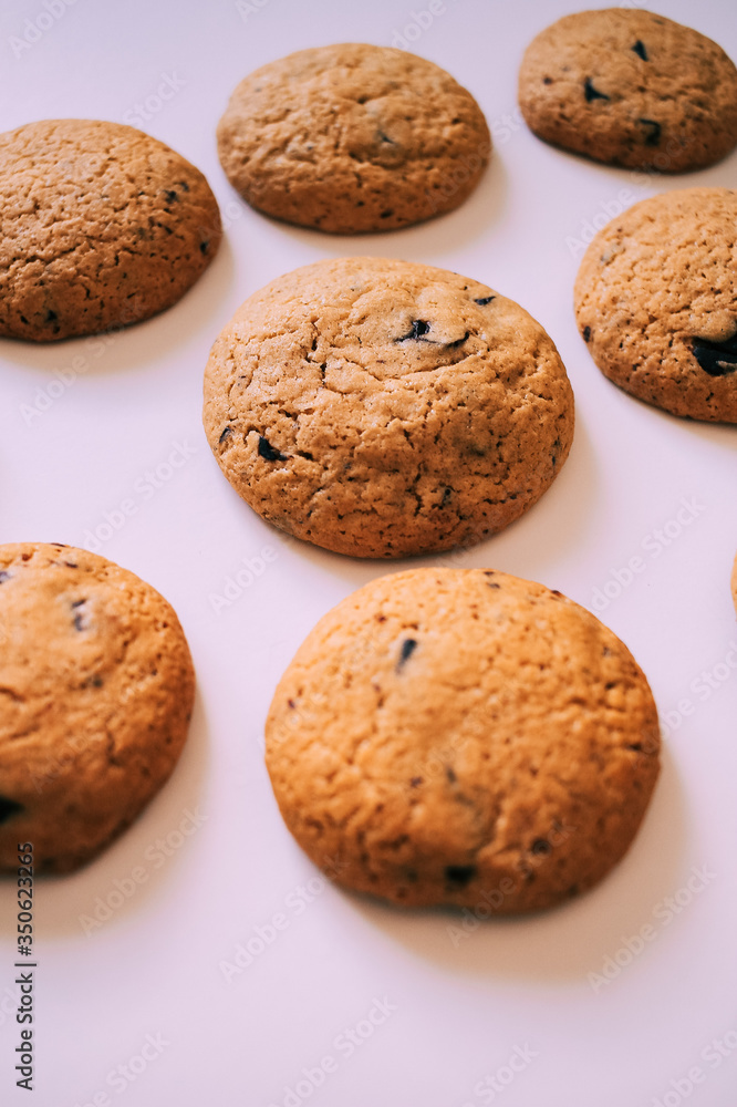 Homemade chocolate cookies isolated on white background with copy space. Homemade chocolate cookies isolated on white background with copy space.