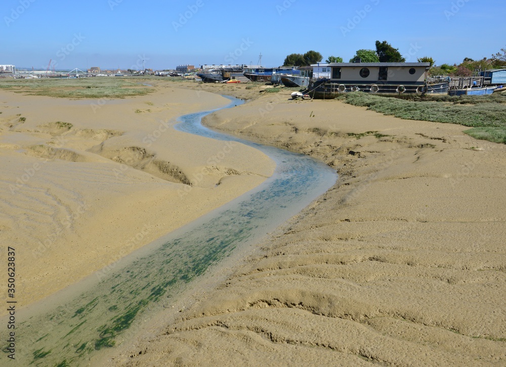 Mud flats at the River Adur Estuary in Shoreham, West Sussex Mud flats at the River Adur Estuary in Shoreham, West Sussex