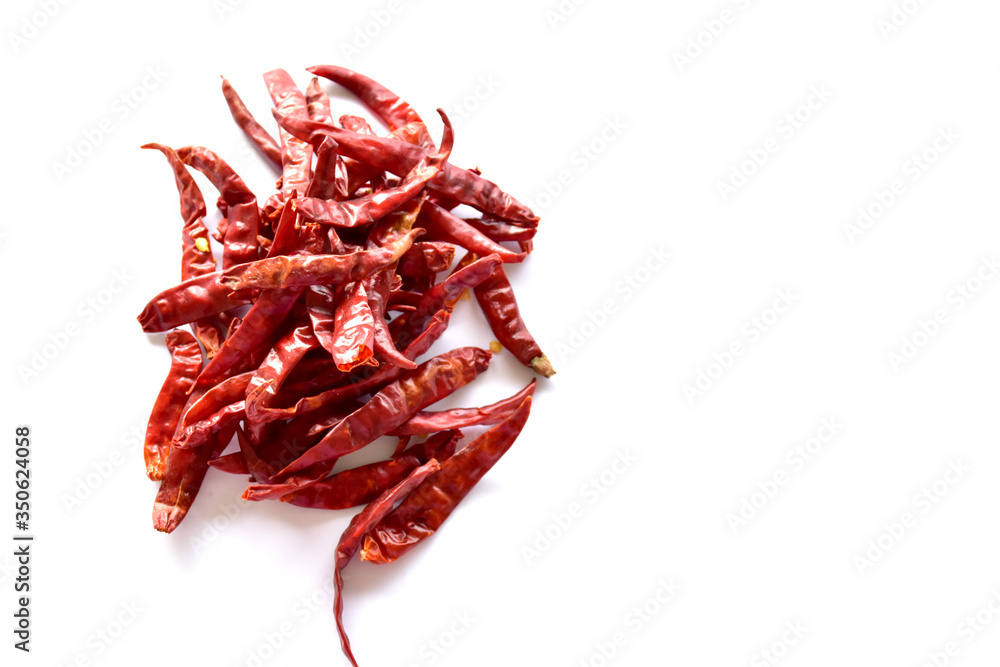Fototapeta premium Dried red chillies on a white background