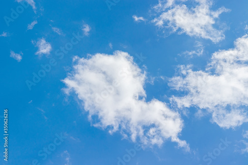 Beautiful blue sky with light white clouds background