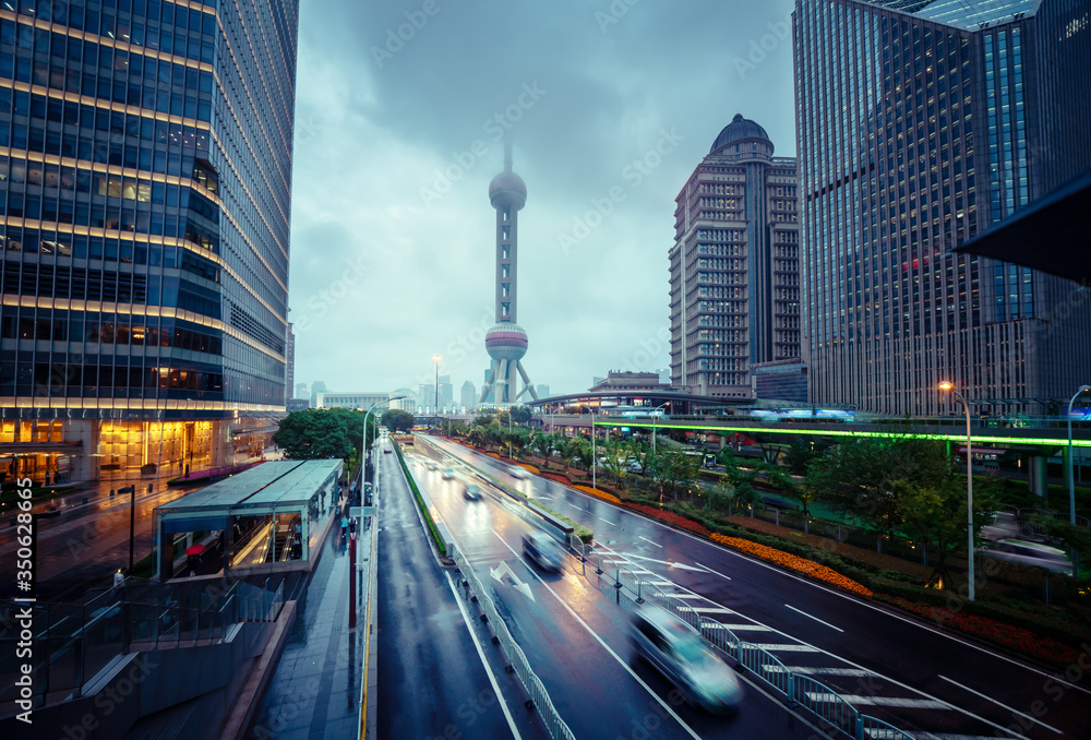 Fototapeta premium wet road in Shanghai Lujiazui financial center, China