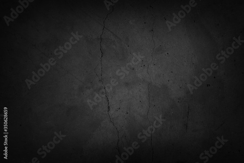 Black textured concrete wall background