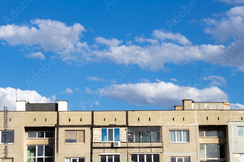 Blue sky behind a soviet block