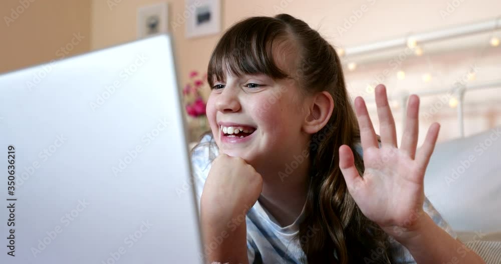Untitled Project Smiling Girl In Bedroom Having Video Chat With Friends On Social Media Using Laptop Computer Untitled Project Smiling Girl In Bedroom Having Video Chat With Friends On Social Media Using Laptop Computer