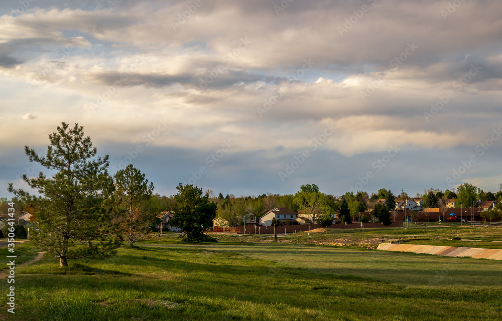 Scenic landscape along the neighborhood trail in the residential area at West Tall Gate Creek in Aurora, Colorado