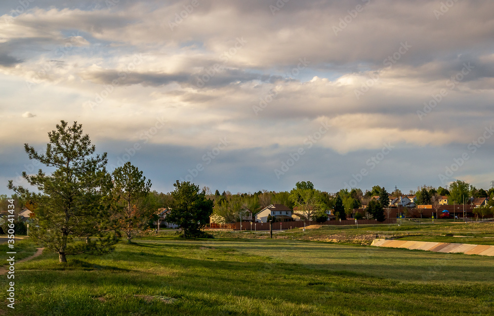 Scenic landscape along the neighborhood trail in the residential area at West Tall Gate Creek in Aurora, Colorado Scenic landscape along the neighborhood trail in the residential area at West Tall Gate Creek in Aurora, Colorado
