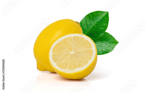 Water drops fresh lemon with leaves isolated on white background with clipping path. © wanniwat