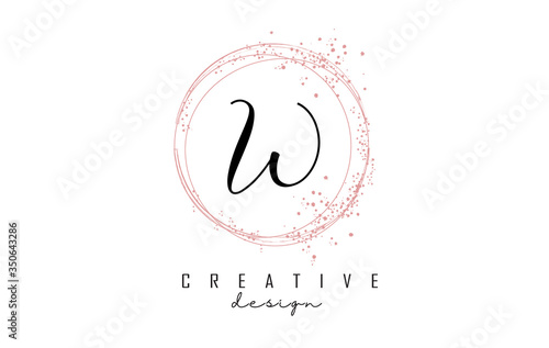 Sparkling circles and dust pink glitter frame for handwritten W letter logo.