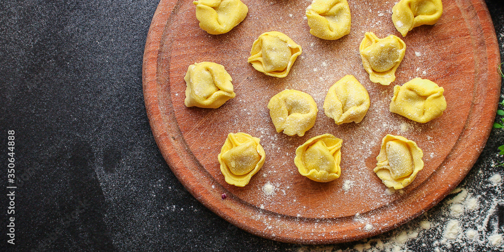 pasta tortellini with filling Menu concept healthy eating. food background top view copy space for text healthy eating table setting pasta tortellini with filling Menu concept healthy eating. food background top view copy space for text healthy eating table setting