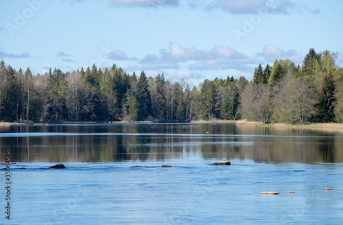 Scenic view of a river landscape in spring. Farnebofjarden national park in Sweden.