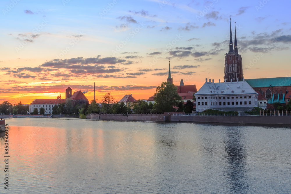 sunset over the Odra River and the historical part of Wroclaw
