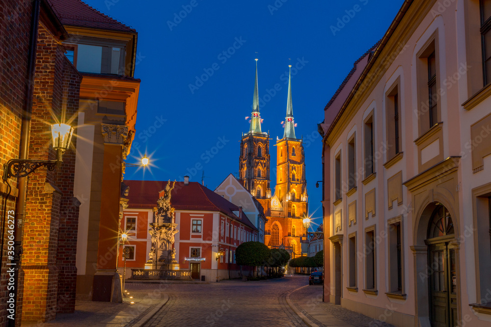 Naklejka premium evening streets and a view of the Wroclaw cathedral