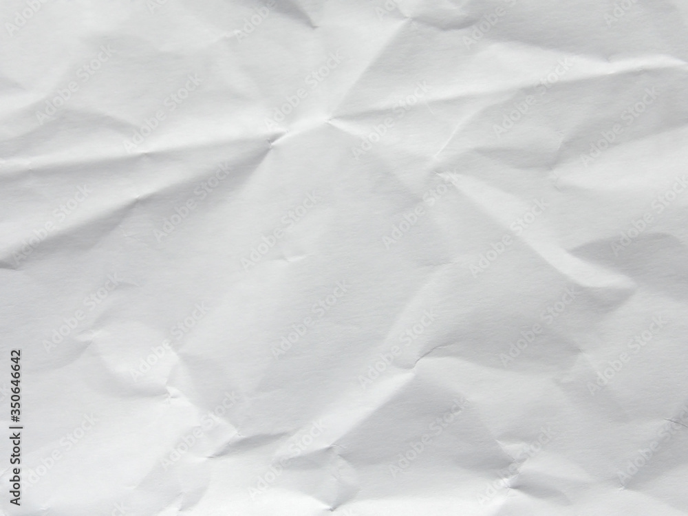 Obraz premium White crumpled paper texture background
