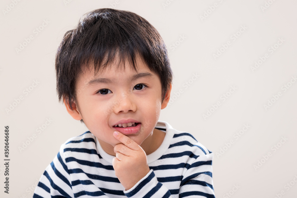 Handsome asian kid on white background Handsome asian kid on white background
