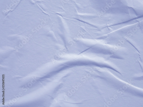 Light blue wet crumpled paper texture background