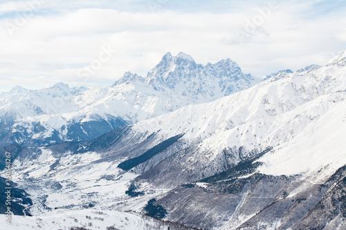 Snow covered mountains in winter © Aleksandre