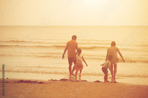Family vacation sunset happy together at the beach love with live strong fight the virus with social immunity.