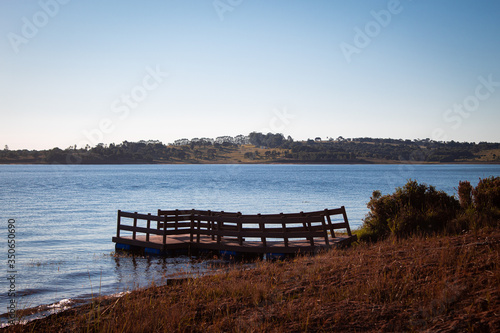 wooden bridge over lake