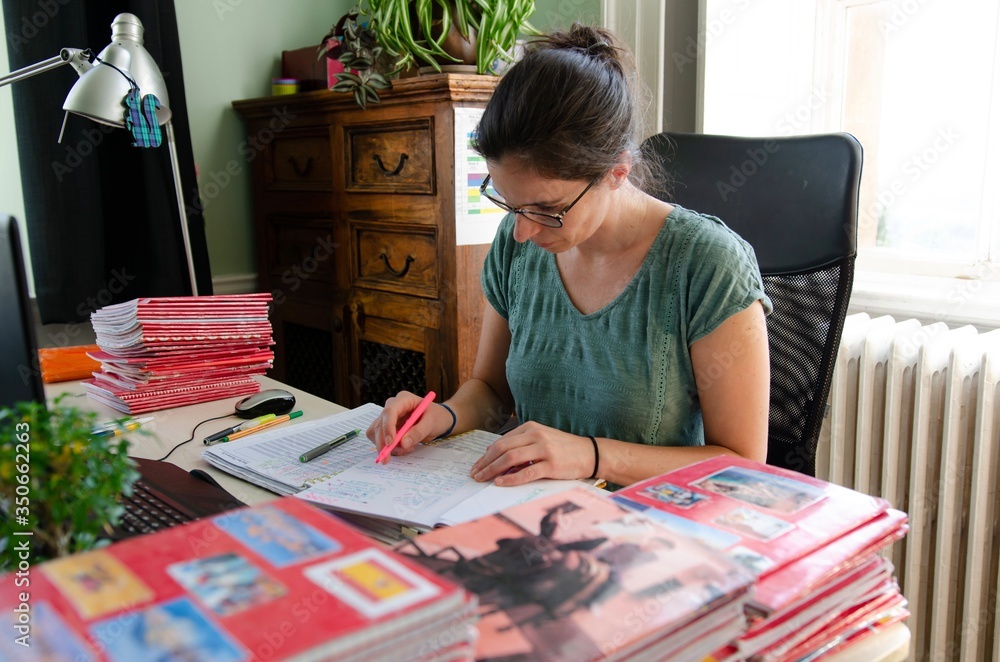 High school and secundary teacher of languages working from home during coronavirus quarantine High school and secundary teacher of languages working from home during coronavirus quarantine