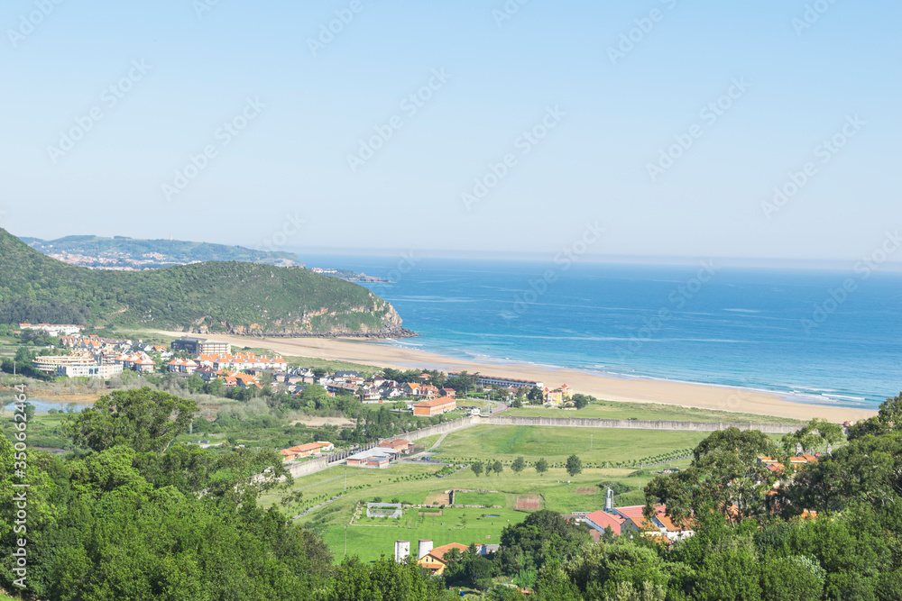 mountain scene with ocean and beach views