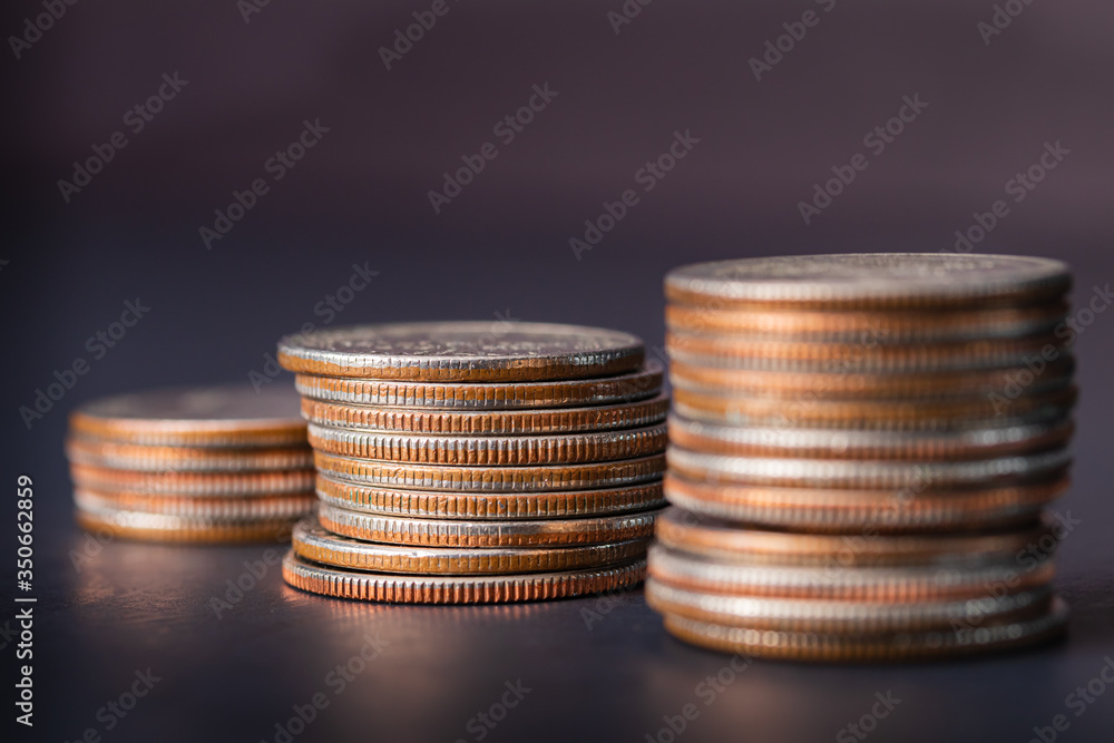 Coins stacked isolated black background money, financial, business growth concept Coins stacked isolated black background money, financial, business growth concept