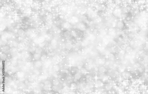 Shiny white and silver christmas bokeh background © Alrika 
