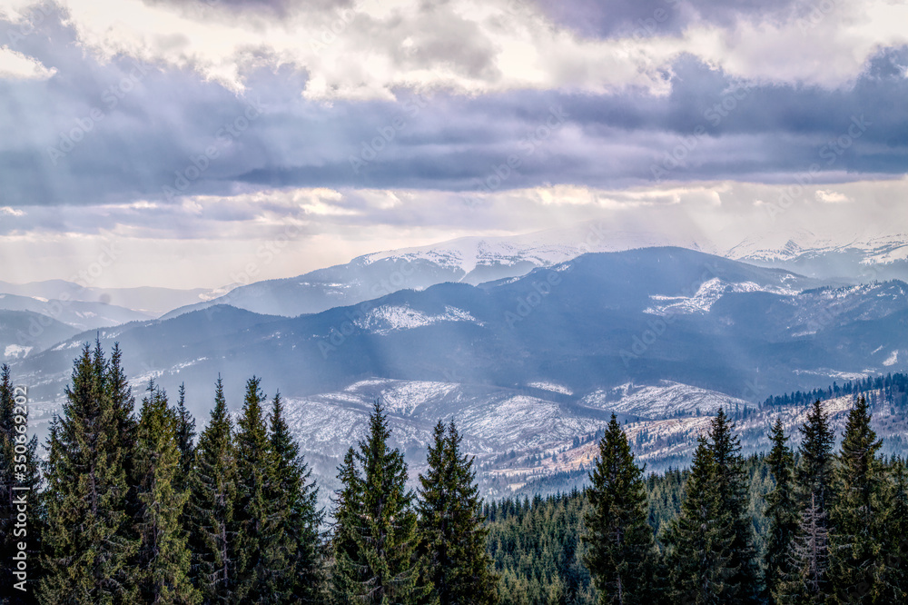 Winter cloudy landscape of the Carpathian Mountains in Eastern Europe	
