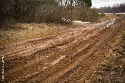 Blurred Russian dirt road in a field