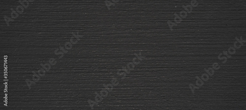 Black anthracite corrugated concrete stone cement wall banner background 