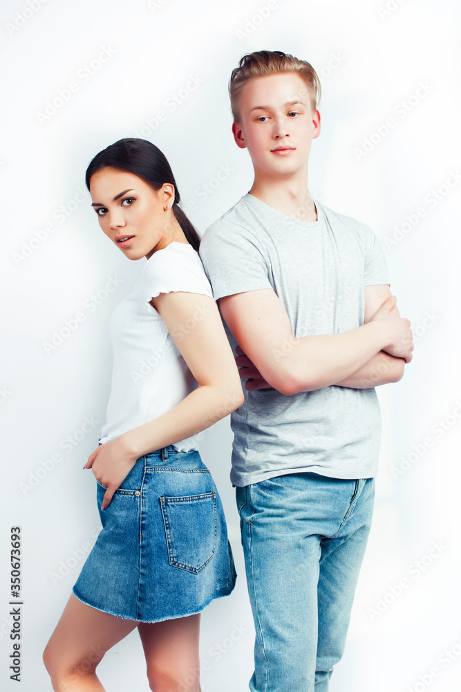 modern hipster guys together couple diverse nations, asian girl and caucasian blond boy isolated on white background, lifestyle people concept modern hipster guys together couple diverse nations, asian girl and caucasian blond boy isolated on white background, lifestyle people concept