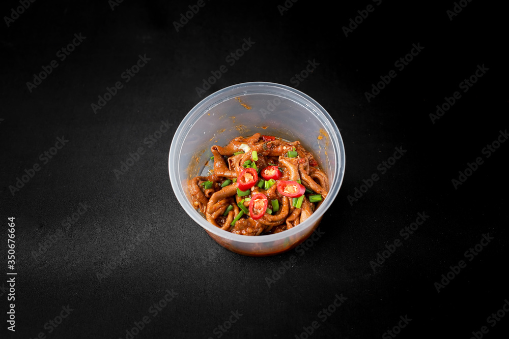 Delicious Yellow Spicy Chicken Intestine (Usus Ayam Pedas) with Fried Dumpling and Vegetables. Indonesian Traditional Food Delicious Yellow Spicy Chicken Intestine (Usus Ayam Pedas) with Fried Dumpling and Vegetables. Indonesian Traditional Food