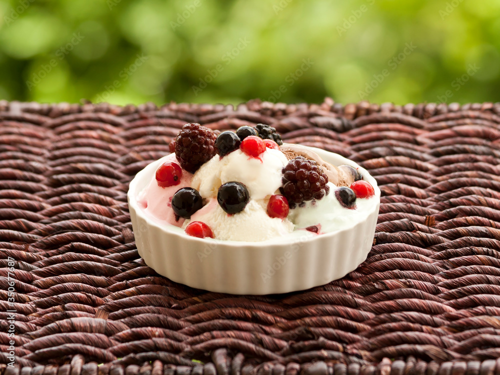 Bowl of ice cream with berries 