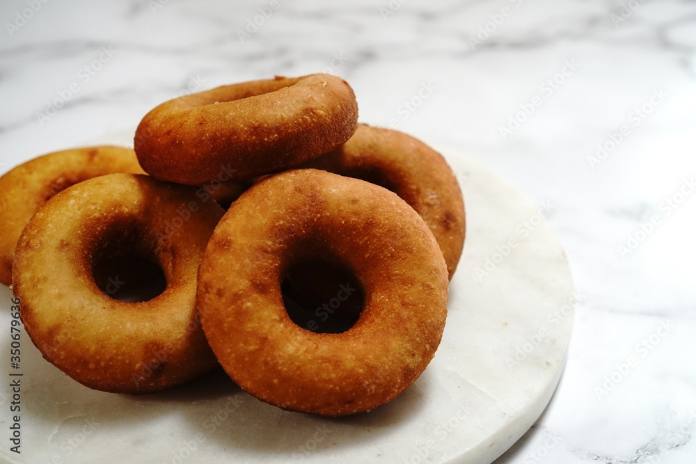 Homemade fresh deep fried Donuts/ Doughnuts, selective focus