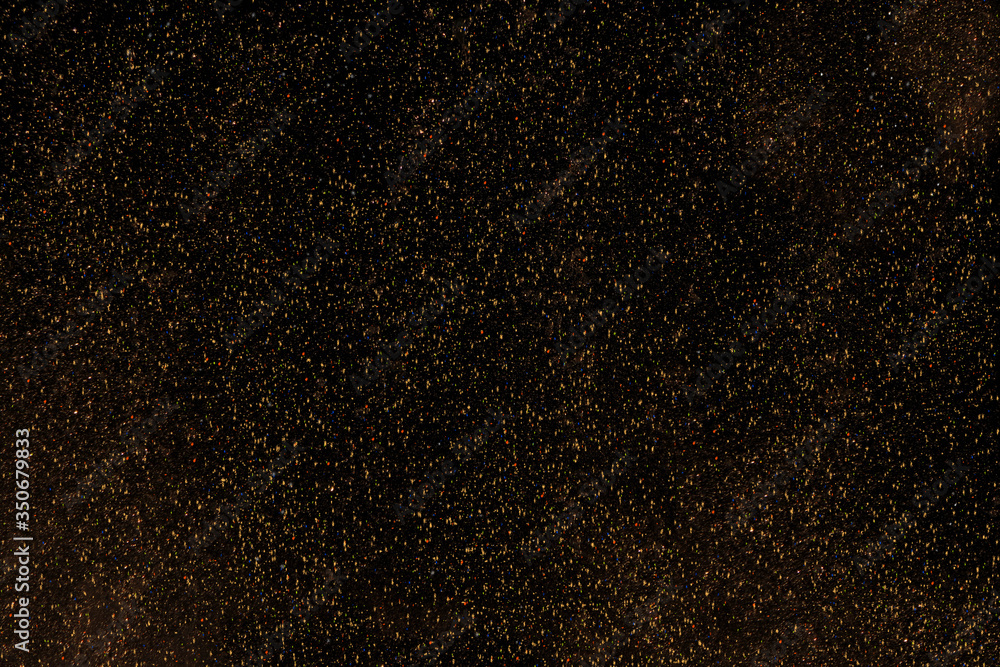 Black abstract background with yellow gold dust. Black abstract background with yellow gold dust.