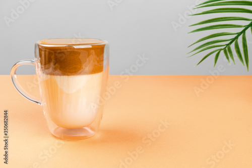 Trendy Korean dalgon coffee drink. An interesting variant of a milk drink with instant coffee. photo