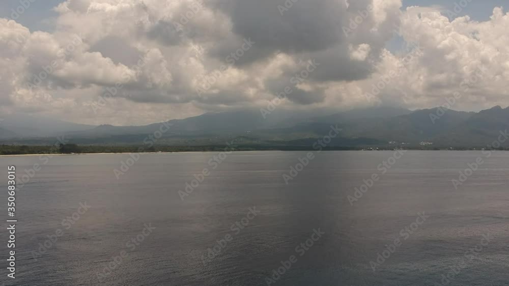 drone take off to meet the mainland with clouds drone take off to meet the mainland with clouds