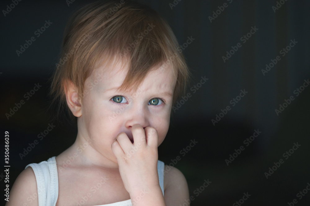 Sad child portrait after an argument with his parents. Sad child portrait after an argument with his parents.