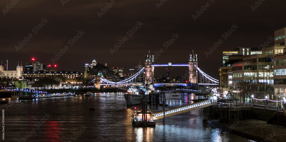 Night photo with illuminated tower bridge in London